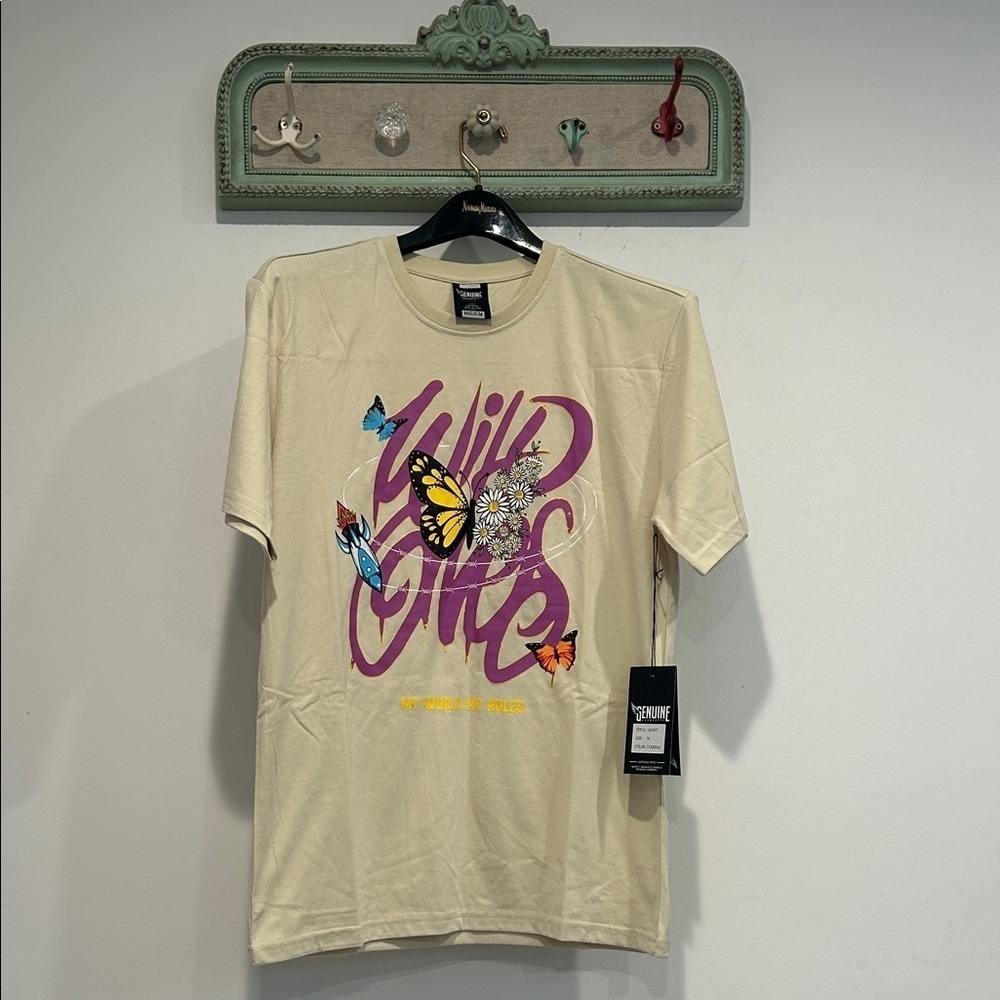 Genuine Merchandise Cream Tee Purple and Yellow wild one’s graphic medium new